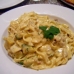 pasta in creamy sauce with chicken and avocado