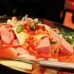 Big hot pot with sausages, hams, instant noodles and kim chi...