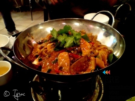 Lamb combination served in small wok Lamb combination served in small wok